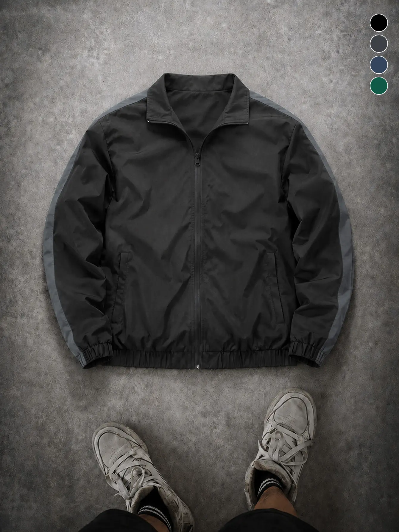 Vintage men’s black-and-gray color-block windbreaker jacket with practical color-block sleeve design and windproof fabric; suitable for casual gatherings and gym outfits; versatile outerwear for all seasons.