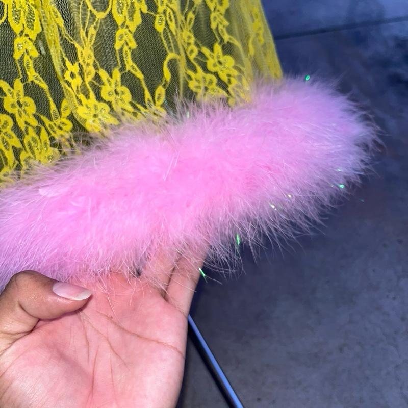 Pink lemonade lace dress with ostrich feathers