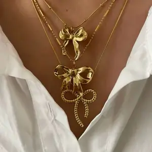 Elegant Gold Plated Bow Knot Pendant Necklace for Women - Stainless Steel