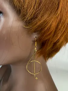 Gold Music Note Earrings - Fashion Accessory for All with Unique Design