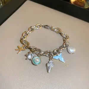 Female Adjustable Ocean Chain Bracelet - Unique Starfish, Shell, Fish Tail Designs, Fashionable Versatile High-End Jewelry Accessory for Beach Use