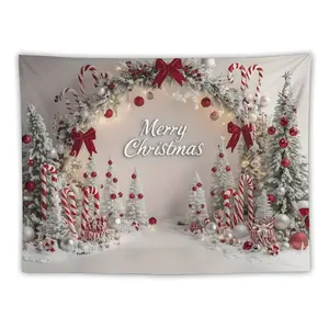 Perfect Party Backdrop Idea! This Red & Green Tapestry with Garland Arch Sets the Mood. #WhovilleDecor #ChristmasTapestry #FestiveVibes