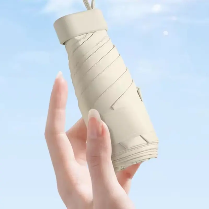 Super Mini Portable Umbrella with UV Protection Capsule Case, Lightweight Waterproof Umbrella, Easy to Carry Windproof Pocket Umbrella for School & Travel, Easy to Carry, Folding Umbrella, Ideal Home Accessory