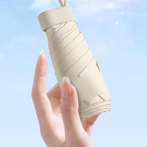 Super Mini Portable Umbrella with UV Protection Capsule, Easy to Carry Pocket Umbrella for School and Travel, Lightweight Umbrella, Ideal Home Accessory