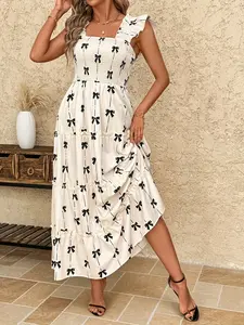 A fashionable white background black bow print dress for women, with a delicate square neckline design and sweet ear ear ear ear shoulder sleeves, suitable for commuting to work, shopping, and outdoor wear