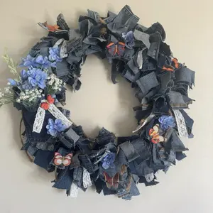 Blue Jean Denim Wired Back Wreath 16” with Lace Ribbon, Jute Yarn & Artificial Baby Breath & Blue Bonnets, Sprinkled with Artificial Butterfly Clips