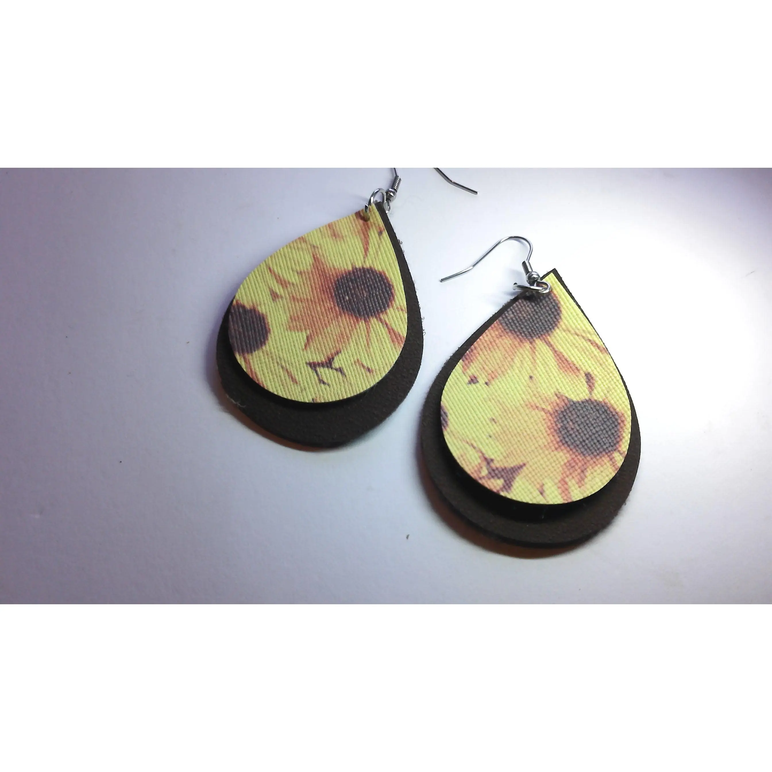 Brown felt earrings with sunflower