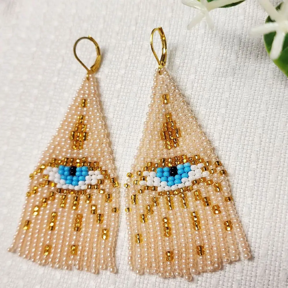 Handcrafted Beaded Earrings with Blue Eyes and Gold  color Accents for Women's Fashion