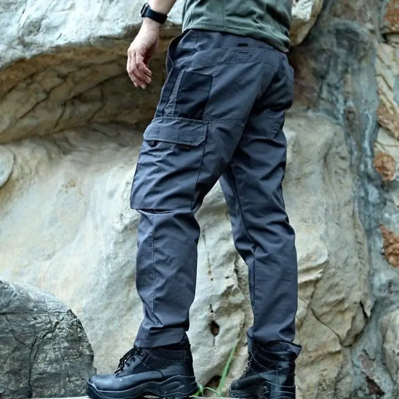Men's durable outdoor training pants, men's multi-pocket work pants, men's solid color and printed pocket zipper waterproof tactical cargo pants without belt, regular fit sports pocket durable autumn pants. Casual Street Trousers