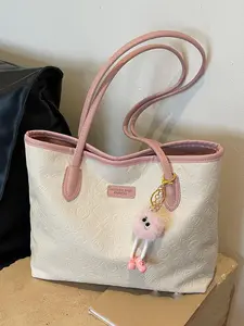 Leisure business handbag shoulder bag with fur ball decoration, lightweight design suitable for teenagers and women, ideal for offices and universities, commuting and shopping in various occasions.