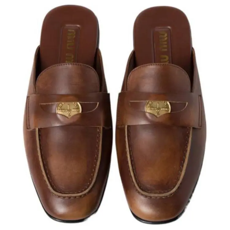 MIU MIU Women's Brown Calfskin Round-Toe Flat Mule Slippers - Trending Footwear, Maison Mihara Official Style Shoes