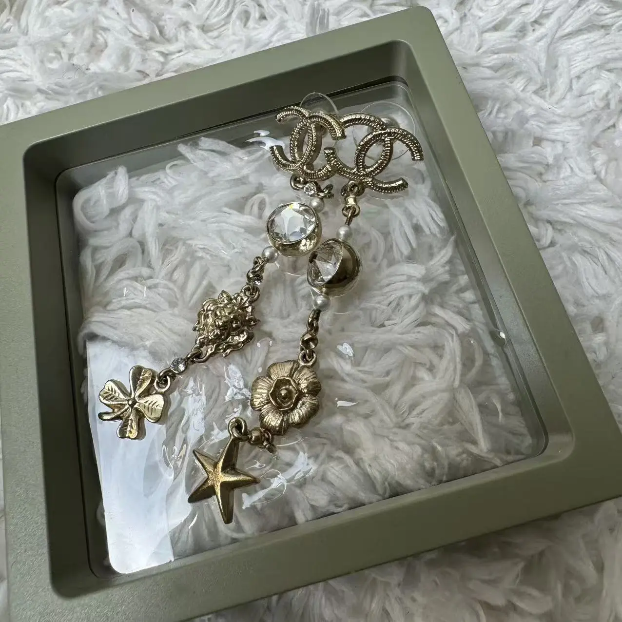 Pre-owned CHANEL Metal Bag Accessories vintage lion, clover, and star charm earrings