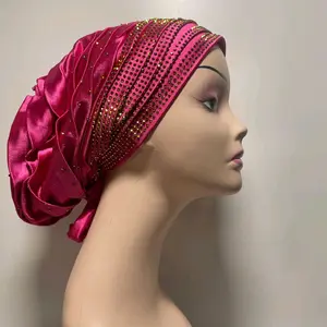 Turban caps available in pink, royal blue, peach and green colors