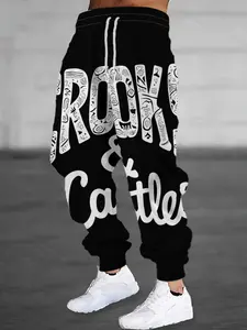 Stylish Men's Printed Sweatpants with White Patterns and Lettering on A Black Background. Features Drawstring and Pockets. Comfortable and Casual Fit. Made of Stretch Polyester.