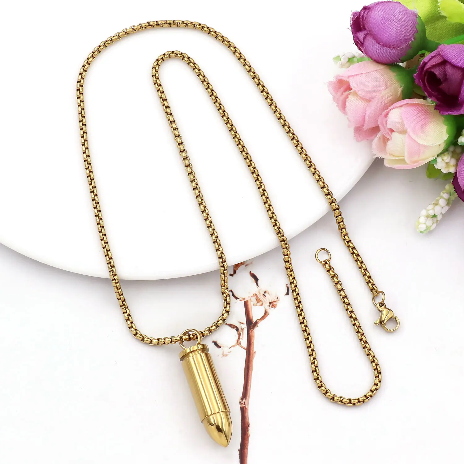 Stainless steel bullet head pendant necklace in gold tone or silver tone, waterproof, hypoallergenic, colorfast; 57 cm chain length + 32 mm pendant—versatile for everyday wear and commuting.