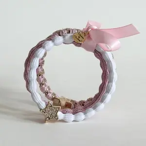 Pink 3 pack hair ties with charm