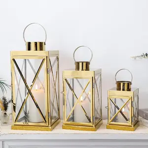 Stainless Steel Lantern Set of 3-Square Elegance 8/12/16 Inch Table Opulent Metal Candle Lanterns with Handle Loop Clear Waterproof Glass Panels for Indoor&Outdoor Decor Celebratory Everyday Gold Finish Decorative Decoration Ornaments