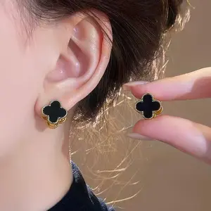 Double sided four leaf grass earrings for women, with small and delicate ear buckles and elegant earrings