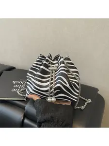 Retro fashion drawstring bucket bag new niche trendy leopard print shoulder bag stylish zebra print crossbody bag