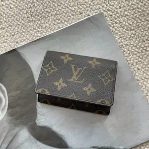 Pre-owned Louis Vuitton leather Clutches & Wristlets monogram coated canvas cardholder