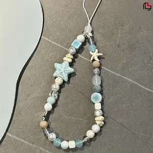 1Pc ocean wind beaded mobile phone lanyard strap, decorated with starfish and stars, DIY camera pendant. Anti-loss mobile phone case wristband, earphone cover, women's bag accessories.