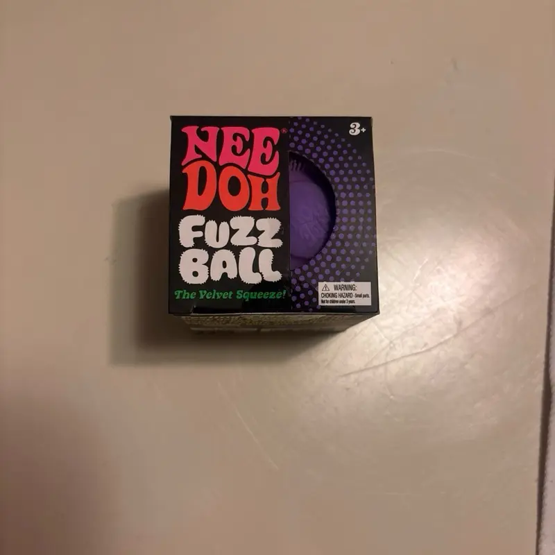 Purple fuzzball squishy