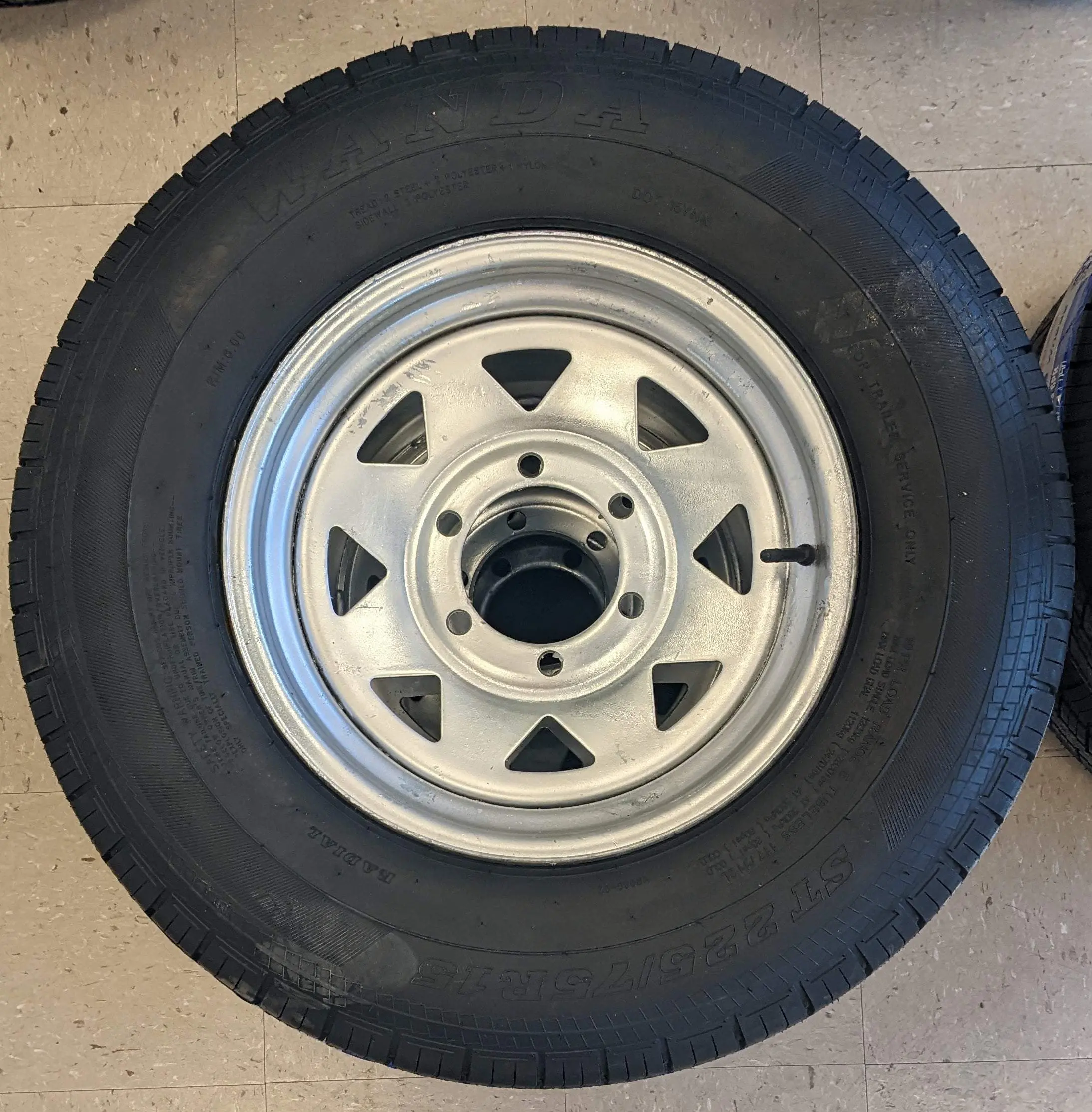 ST225/75R15 LRE 6 ON 5.5 Silver Modular Tire On Rim