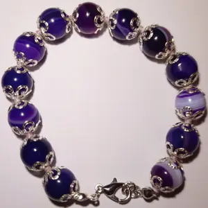 Amethyst Tide Bracelet - Elegant Purple Swirled Beads with Ornate Silver Caps & Whimsical Dolphin Clasp - 7 to 7.5 Inches Length - Compact & Portable Jewelry
