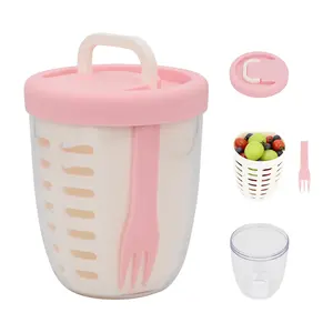 Fresh fruit salad storage cup with folding handle, lid, fork, and drain basket. This reusable, leak-proof food storage container with a removable strainer keeps food fresh longer. 22 oz (pink).