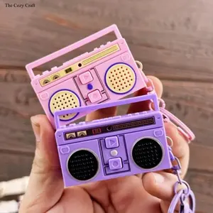 2Pcs Retro Mini Radio & Recorder Keychain Set, Vintage Plastic Bag Charms with Elastic Hair Tie Lanyard. Cute trendy accessories, classic nostalgic ornaments, lovely daily decor and thoughtful thank-you gifts for everyone.