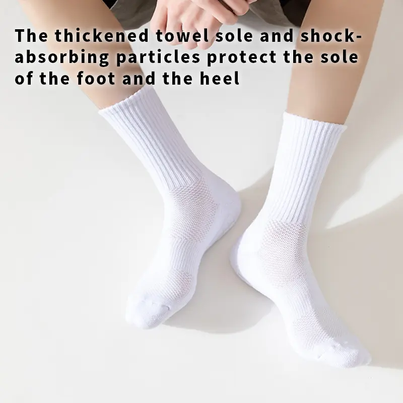 Men's basketball sports socks with thickened terry cloth soles, providing protection for the ankles. They are unisex and suitable for all seasons.