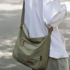 Men's shoulder bag, lightweight cloth bag, women's large-capacity backpack, men's versatile Japanese messenger bag, college student class schoolbag