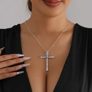 Vintage Distressed Turquoise Cross Necklace with Elegant Silver Chain and Unique Stone Accents
