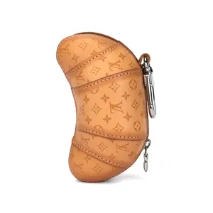 Louis Vuitton Croissant Leather Charm Pouch – Unisex Monogram Style in Tan