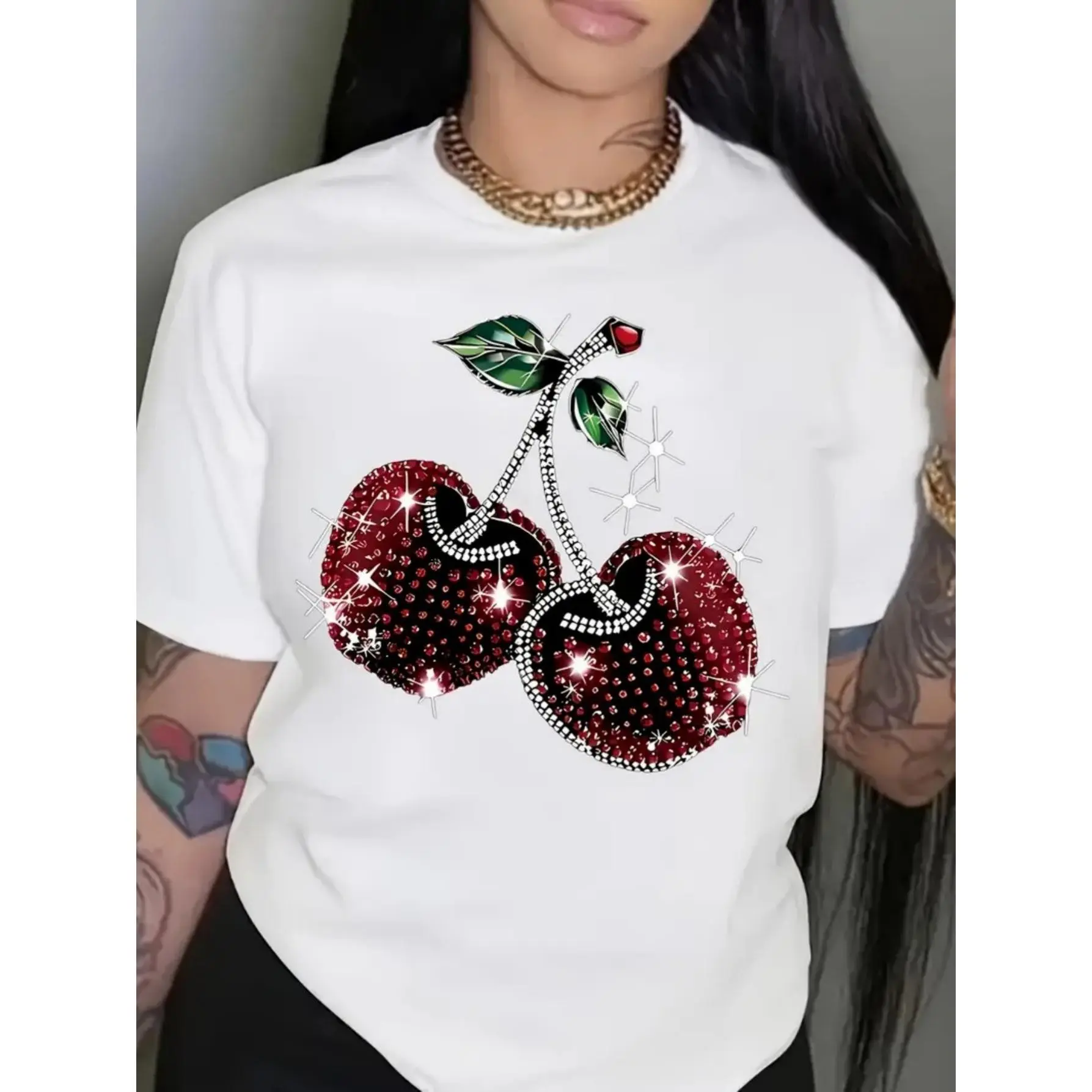 Plus size ladies' cotton short - sleeve T - shirt. Features sparkly rhinestone - embellished cherries with leaves. Machine washable, breathable, loose - fitting and suitable for all seasons.