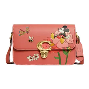 COACH x Disney Studio 25 Mickey Mouse Floral Pattern Leather Crossbody Bag for Women in Coral Red