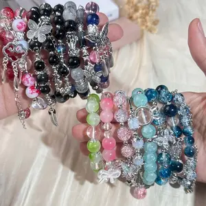 10 Pieces Mix Romantic And Elegant Bracelets for Teenager Featuring Sparkling Cracked Glass Beads Butterfly Feather Star Cross And Bow Pendants Unique Vintage Design Perfect Gift