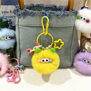 Cute cartoon keychain ugly cute creative small coal ball plush doll schoolbag pendant student doll gift