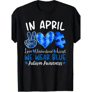 April Is Autism Awareness Month, And We Don Blue Shirts Featuring a Retro Puzzle Piece And The Autism Symbol. This Comfortable Unisex Tee Is Perfect for Men And Is Part of Autism-Themed Clothing