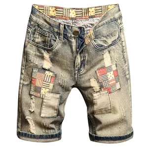 Men’s summer retro denim shorts — trendy, non-stretch, distressed/washed look; versatile casual mid-rise with patchwork and color blocking; straight cut, knee-length; plaid patch details; commuter-friendly; high-waisted design; fashionable outdoor everyda