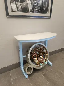 Interior Accent Table with Wine Rack Mounted Inside Large Industrial Gear Recycled Glass Top Metal Frame Unique Design