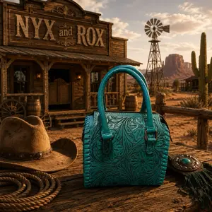 Mini Turquoise Tooled Speedy Handbag with Floral Embroidery and Blue Handles