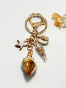 Niche design ocean style shell starfish keychain, personalized creative design, small and exquisite, beach style shell starfish keychain pendant small object, shoulder crossbody bag ocean element key pendant