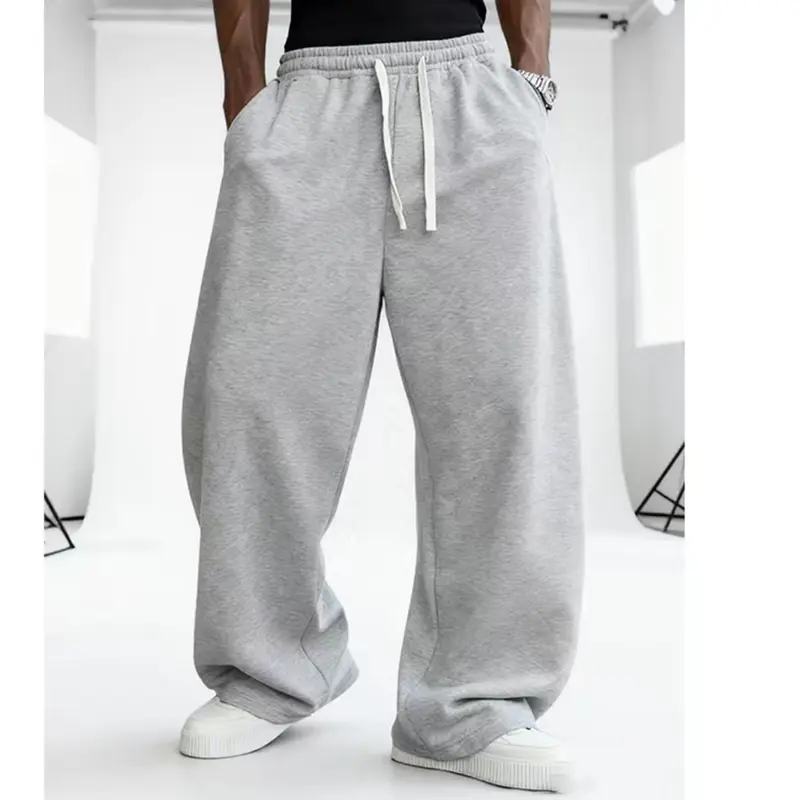 Casual Loose Drawstring Pants, Comfortable Fleece Fabric, Elastic Waistband with Drawstring Design, Suitable for Casual Gatherings, Street Style, and Everyday Wear, Stylish Casual Long Pants, an Ideal Choice for Autumn and Winter.