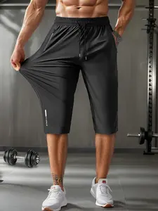 Men’s 7/8 ice silk breathable high-stretch pants with a drawstring waist and zippered pockets; comfortable and skin-friendly, suitable for outdoor jogging and gym workouts.