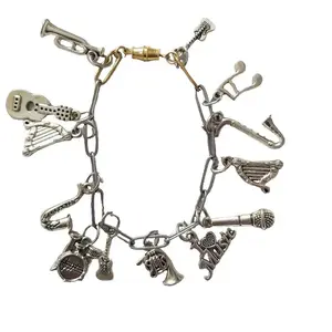 LipsGal Cosmetics LLC Music Lover's Charm Bracelet with Guitar Trumpet Saxophone and Drum Charms for Music Enthusiasts Stylish Functional Gift Idea