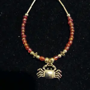 Handcrafted Navajo Silver Crab Bracelet with Red-Colored Beads