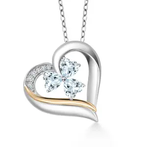 Gem Stone King 925 Sterling Silver and 10k Yellow Gold Sky Blue Aquamarine and White Lab Grown Diamond 3-Stone Pendant Necklace For Women (1.29 Cttw, Gemstone Birthstone, Heart Shape 5MM, 18 Inch Chain)