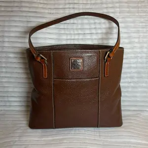 Authentic Dooney & Bourke pebble leather tote. Excellent condition with minimal signs of wear