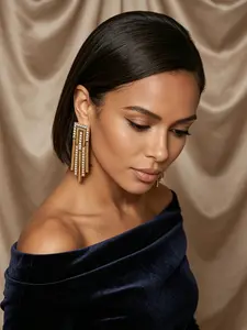 A pair of retro vintage gold geometric staircase inlaid diamond pendant earrings, with curved lines and scattered metal strips, exuding a modern retro atmosphere, suitable for daily commuting, light business, retro dressing, and party scenes.
